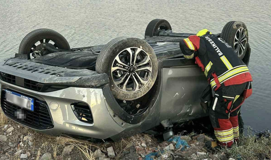 Balıkesir’in Burhaniye ilçesinde virajı alamayan bir otomobilin yol dışına savrularak