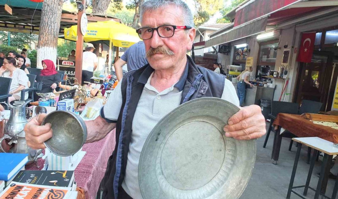 Burhaniye’de İshak Paşa tabağı ilgi gördü Burhaniye ilçesinde, Şehit Turhan Bayraktar Parkında düzenlenen ikinci el mezadı